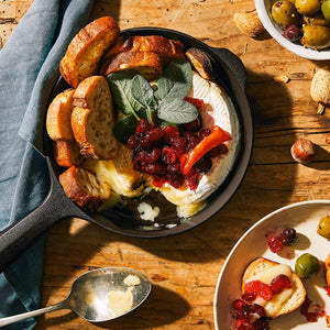 Cast Iron-Baked Brie with Cranberry and Savory