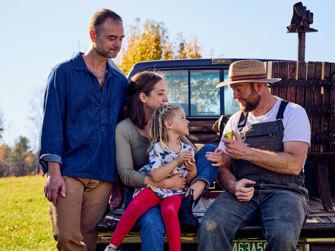 Field's founders and family on a truck tailgate in Vermont